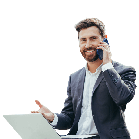 Kaufmännischer Angestelter am Handy mit Laptop